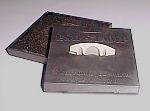 Self inking stamp housing and elastomer with foam pad.
